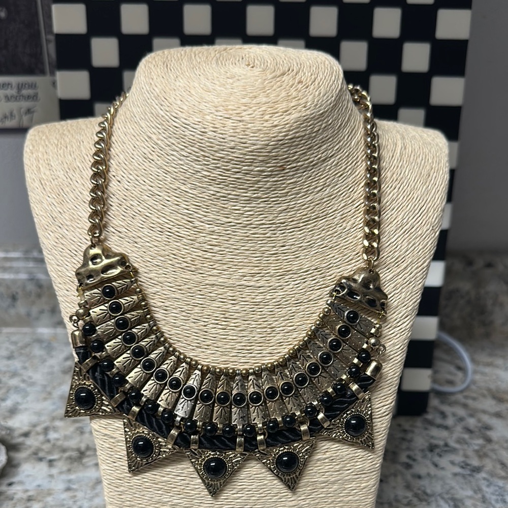 Elegant Gold and Black Statement Necklace